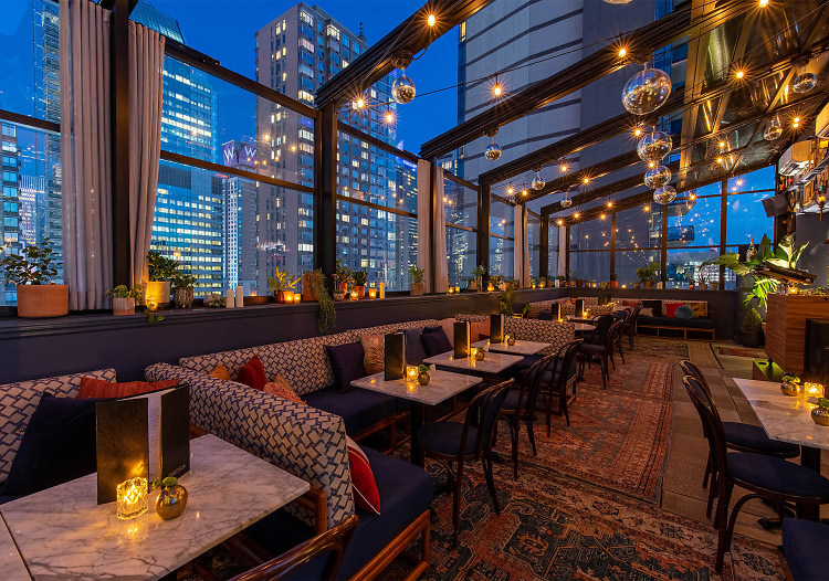 The Fleur Room bar at Moxy Chelsea is a botanical paradise with a view